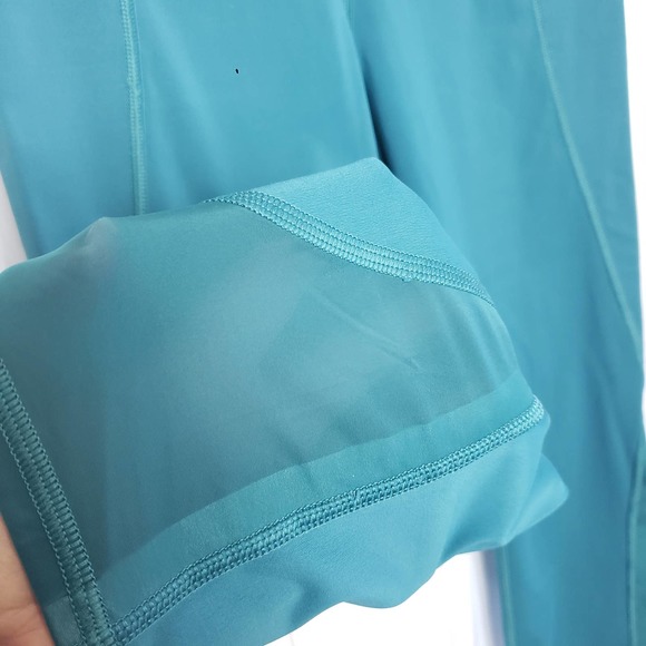 Athleta Size M‎ Lighting Capri Leggings Stash Pockets Mesh Reflective Strip Teal - Picture 8 of 12